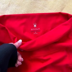 Mid length red Spyder biker shorts